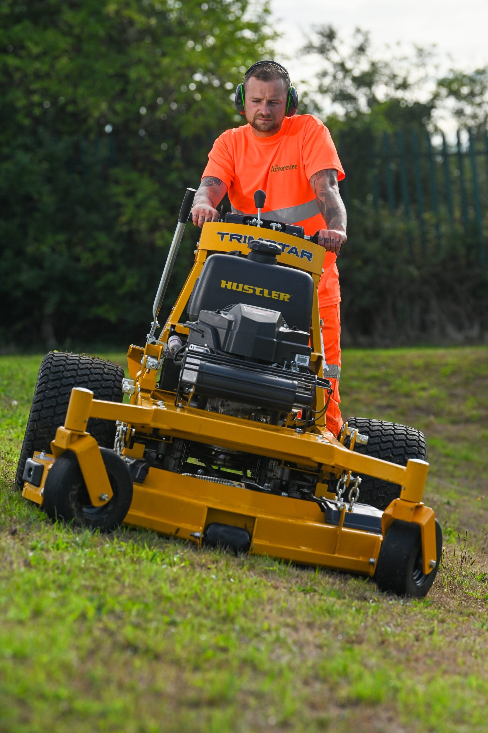 Arborcure employee carrying out grounds maintenance